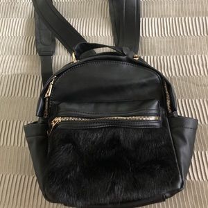 Black faux leather backpack
